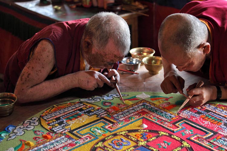 Tibetan Mandala - monks concentrating